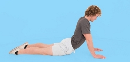 Photograph of doing a back bend (modified push-up) for low back pain 